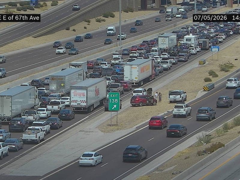 Heavy traffic and stopped vehicles on eastbound I‑10 after a reported multi‑vehicle crash that closed lanes, causing major backups.