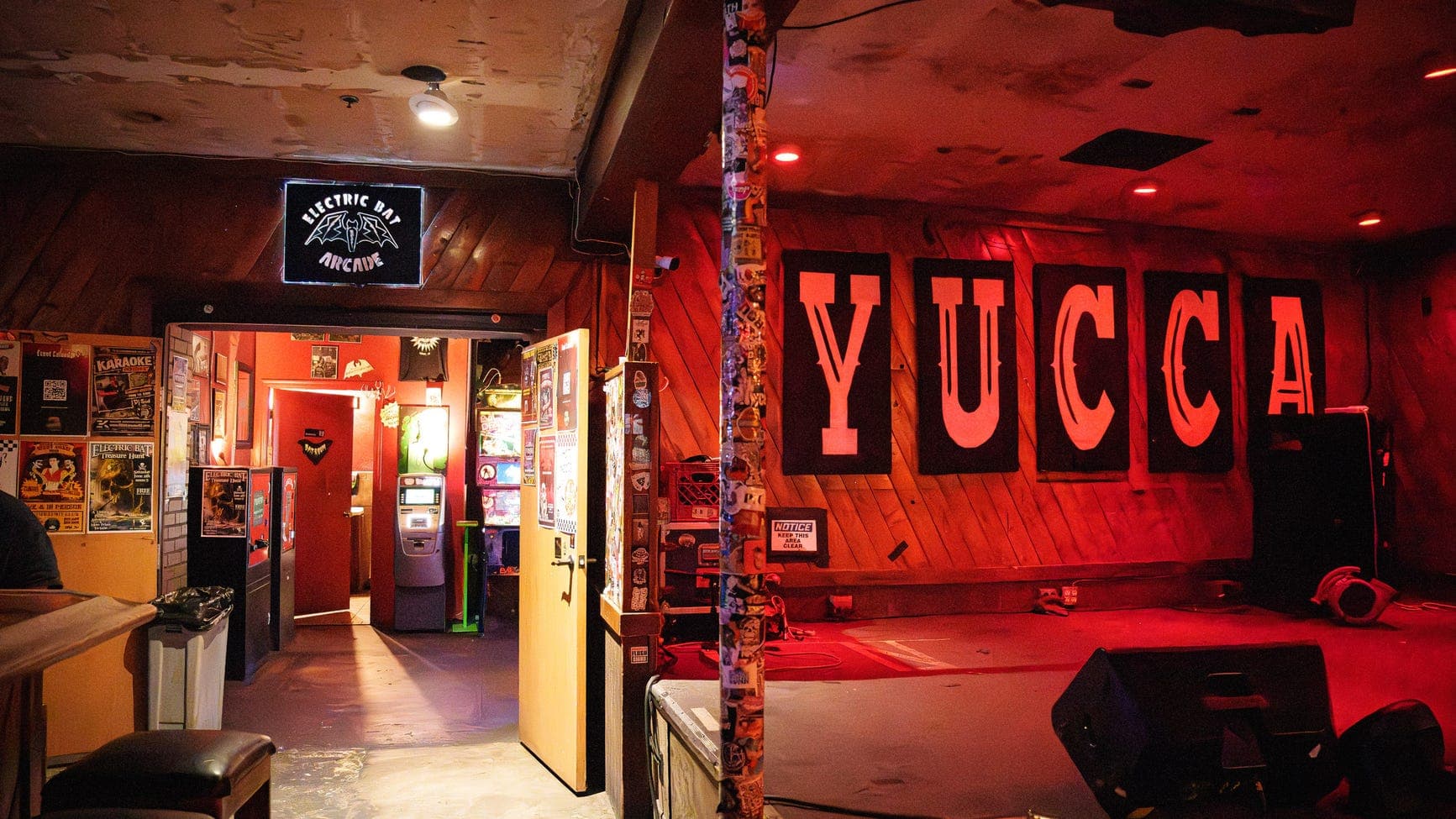 Yucca Tap Room's stage with large 'YUCCA' letters — the Tempe bar named to USA TODAY's 2026 Bars of the Year list.