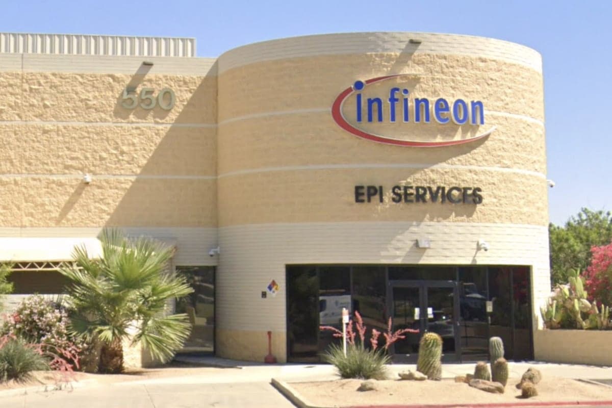 Infineon logo on the exterior of the Mesa semiconductor facility — the site the company closed, resulting in 98 job cuts.