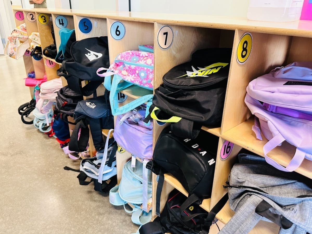Backpacks stored in numbered cubbies at a community center ahead of the Tucson July 18 back-to-school event that will distribute free school supplies and offer haircuts.