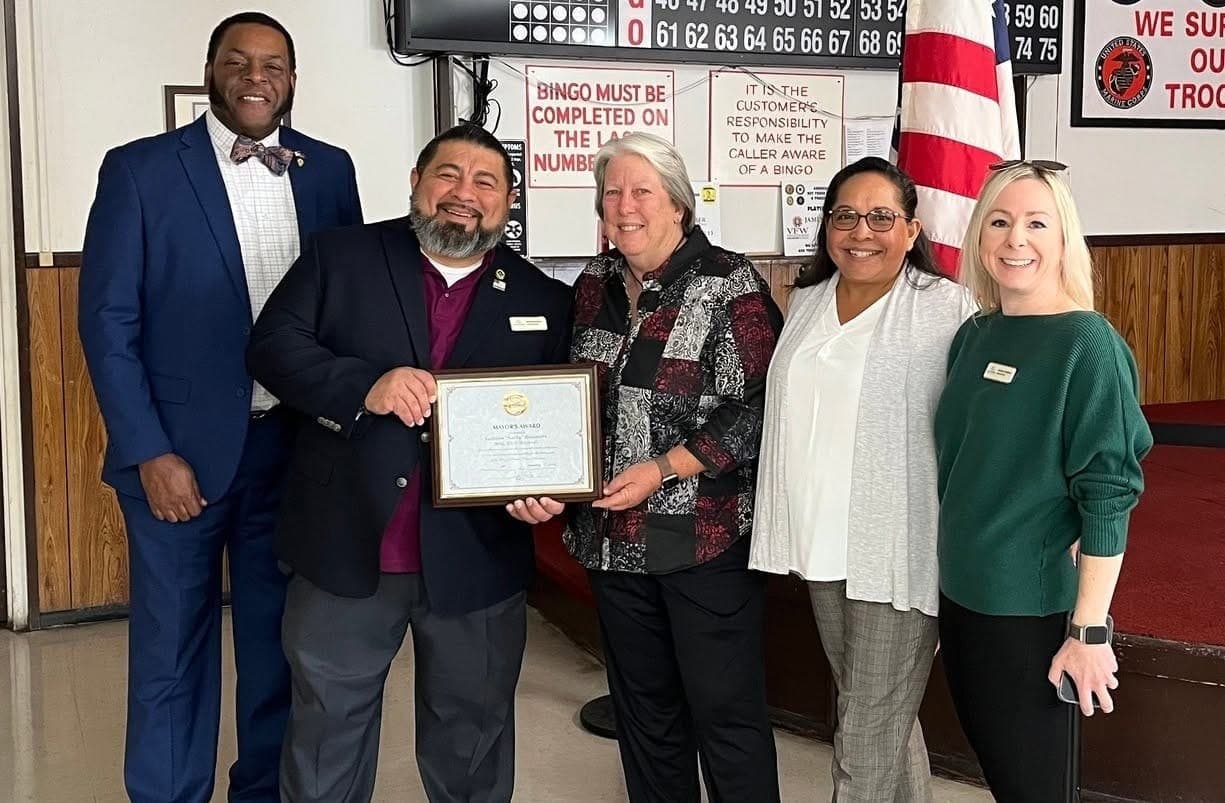 Sierra Vista officials accept a framed certificate at a local VFW hall; the city's vice mayor has announced a bid for mayor after eight years on the council.