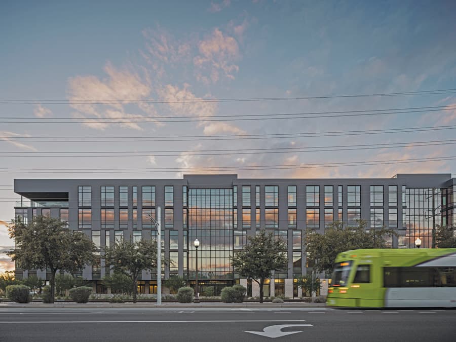 The University of Arizona Andrew Weil Center for Integrative Medicine, pictured from the street as a light-rail vehicle passes, was an Award of Merit winner in the Higher Education/Research category.