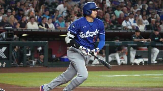 A Los Angeles Dodgers batter swings during the extra-innings game against the Arizona Diamondbacks at Chase Field on Aug. 8, 2026.