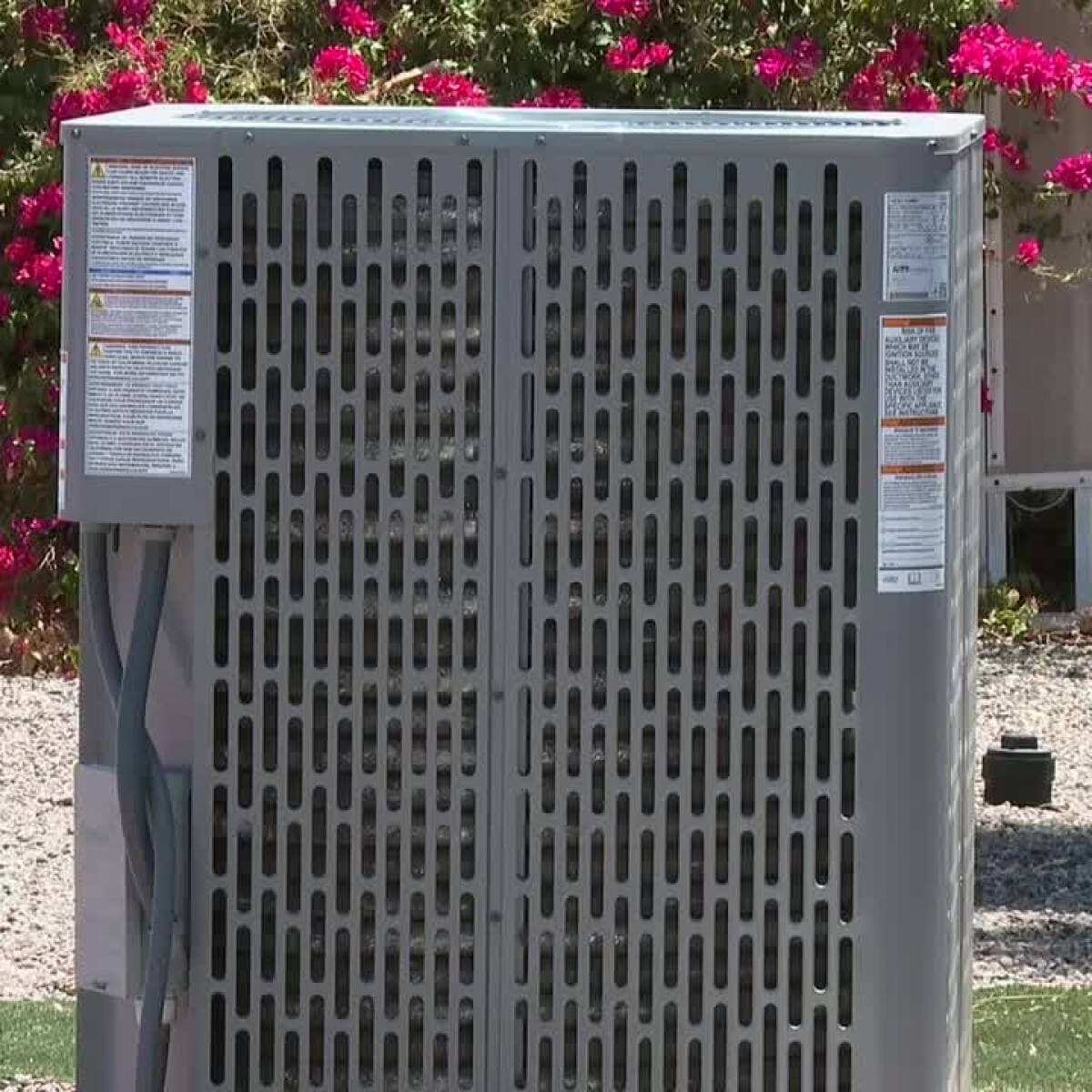 A residential outdoor air-conditioning unit in the Valley, where residents are relying on nonprofit and city programs amid an air-conditioning crisis.