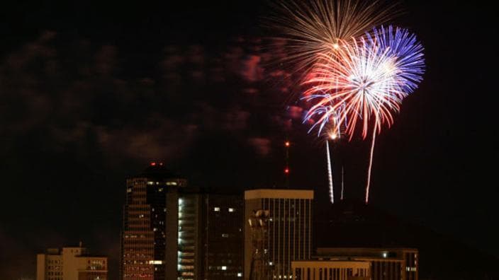 Fireworks light up the night sky above downtown Tucson during Independence Day celebrations.