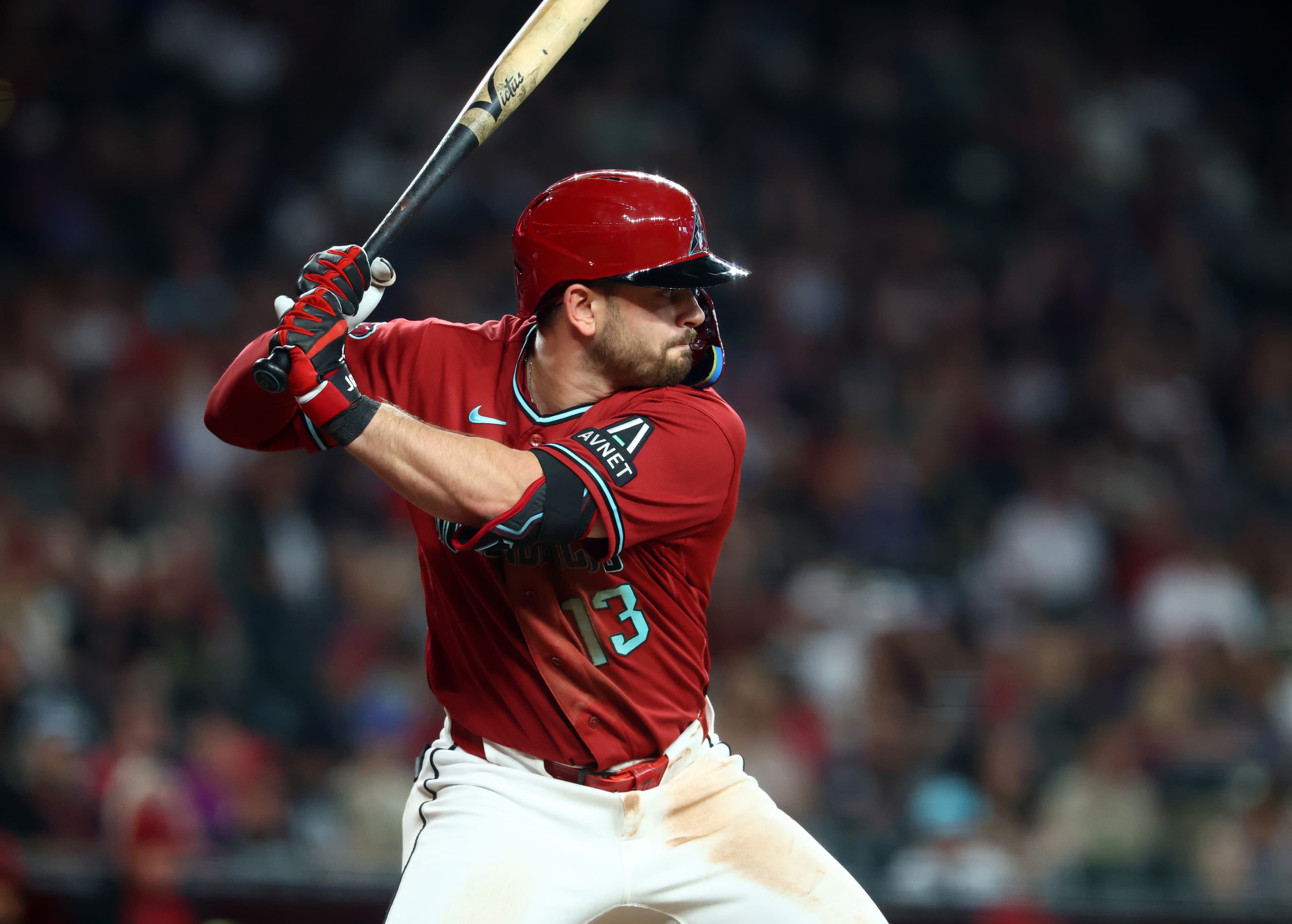 Diamondbacks hitter readies for a swing in a home uniform at Chase Field as the team reshuffles its roster following the decision to option a rookie infielder.