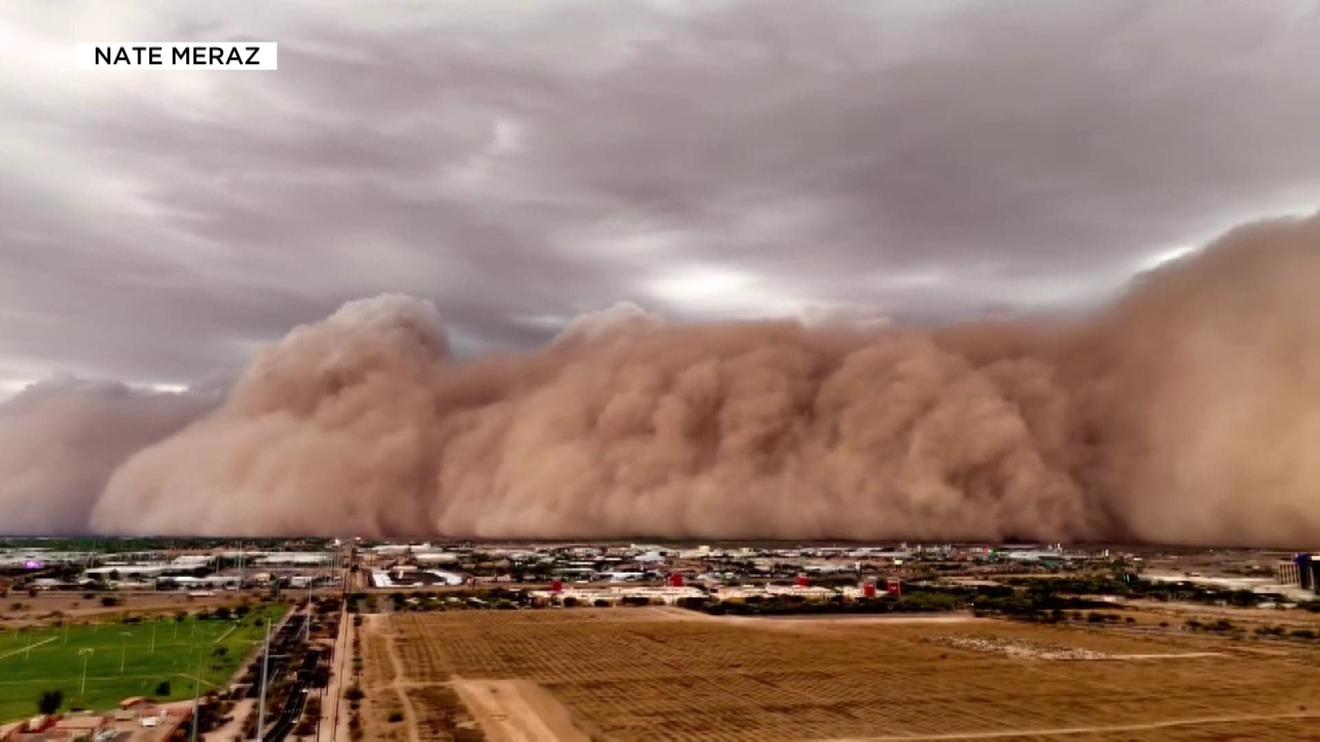 A massive dust wall (haboob) pushes across the Phoenix metropolitan area, dramatically reducing visibility and raising respiratory health concerns as the monsoon ramps up.