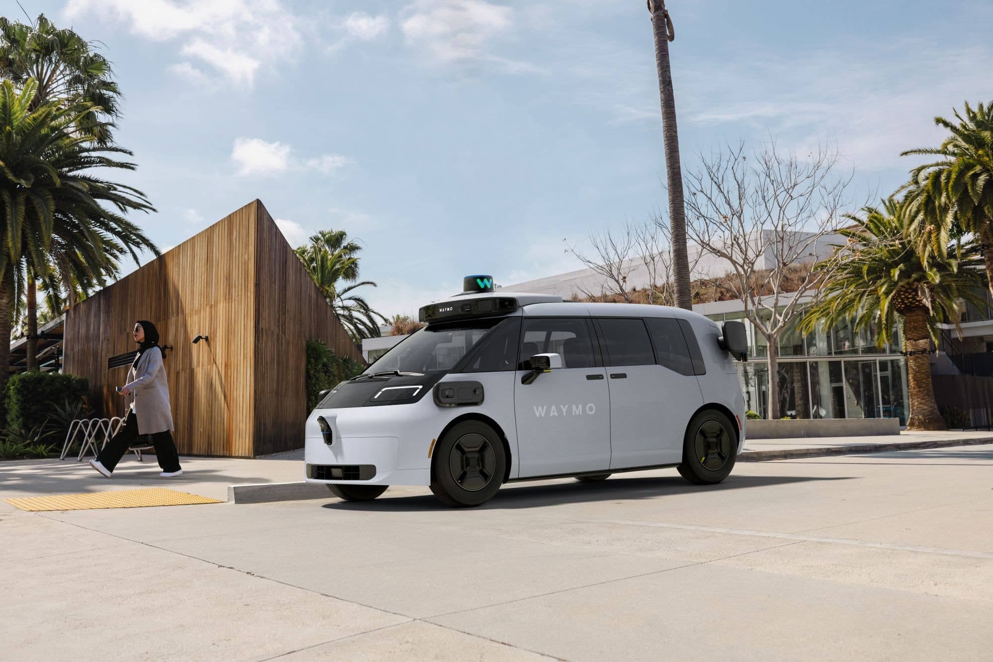 A Waymo autonomous minivan on a city street — vehicles like this were used in the nearly three‑year Waymo–Uber robotaxi pilot that wrapped up last month.