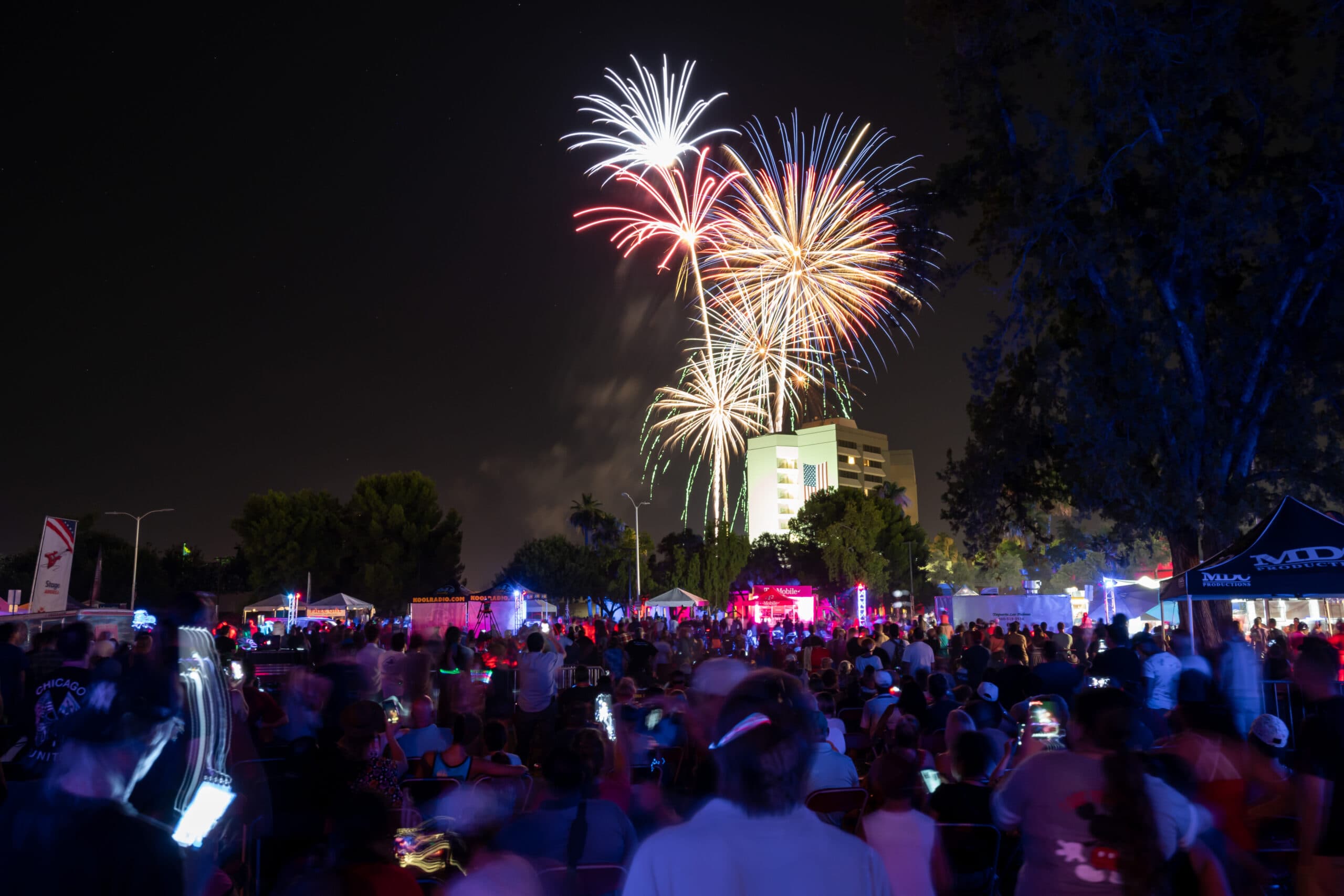 Fireworks burst over a packed downtown Mesa crowd during the Willmeng Arizona Celebration of Freedom evening program.