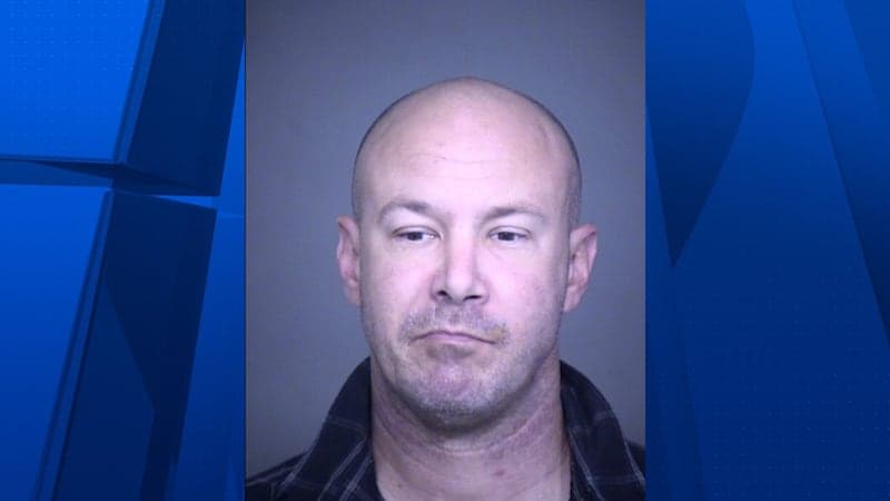Booking photo released in connection with the Mesa stabbing investigation — a person detained after a man was found stabbed and died at the scene.
