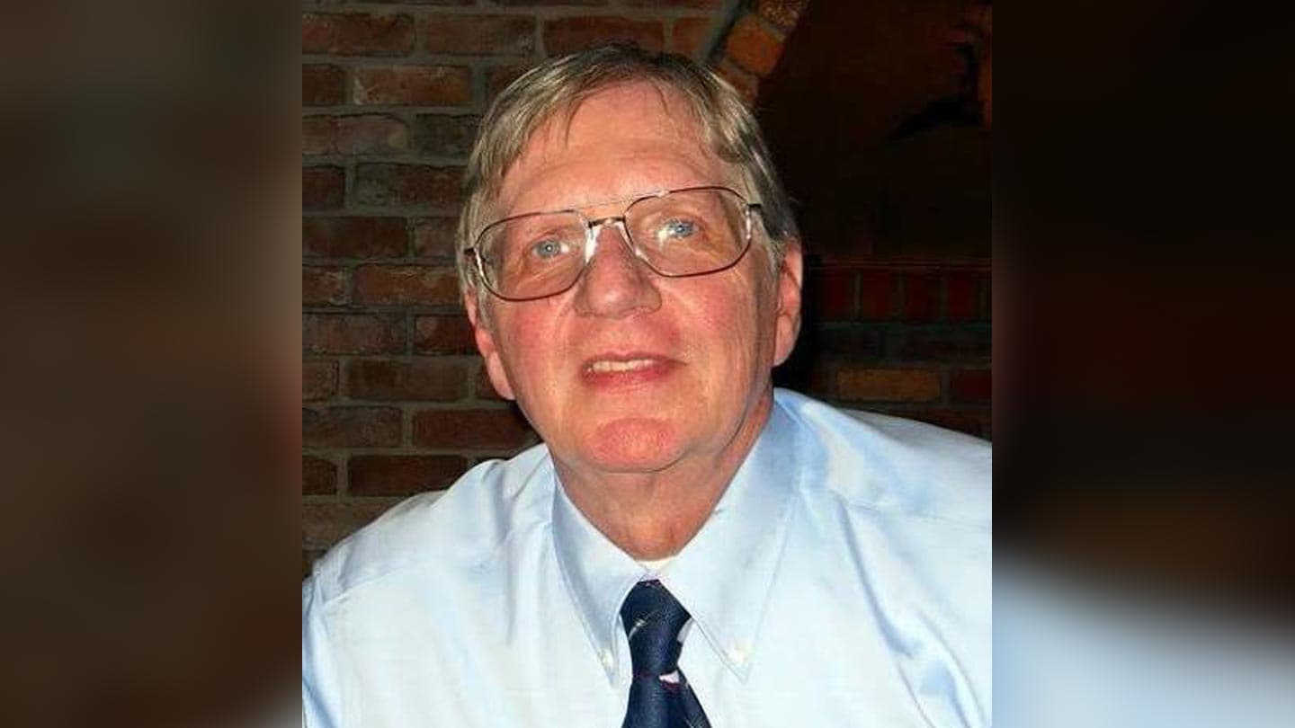 Portrait of a man in a dress shirt and tie used with an article about sexual‑harassment claims and the recent resignation of the Pima County treasurer.