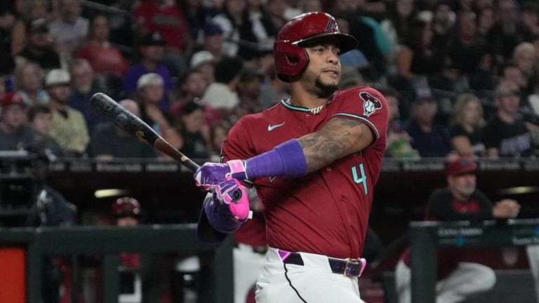 A Diamondbacks batter follows through on a swing during the Brewers series, one of the team's offensive moments in the loss.