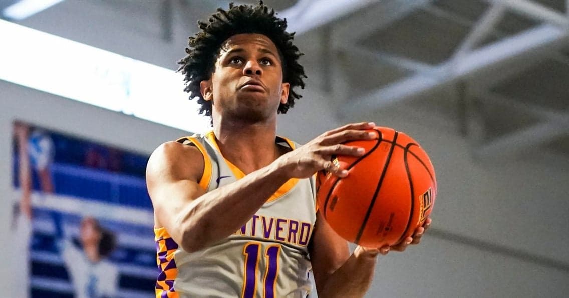 Montverde Academy guard (No. 11) elevates for a shot during a game.