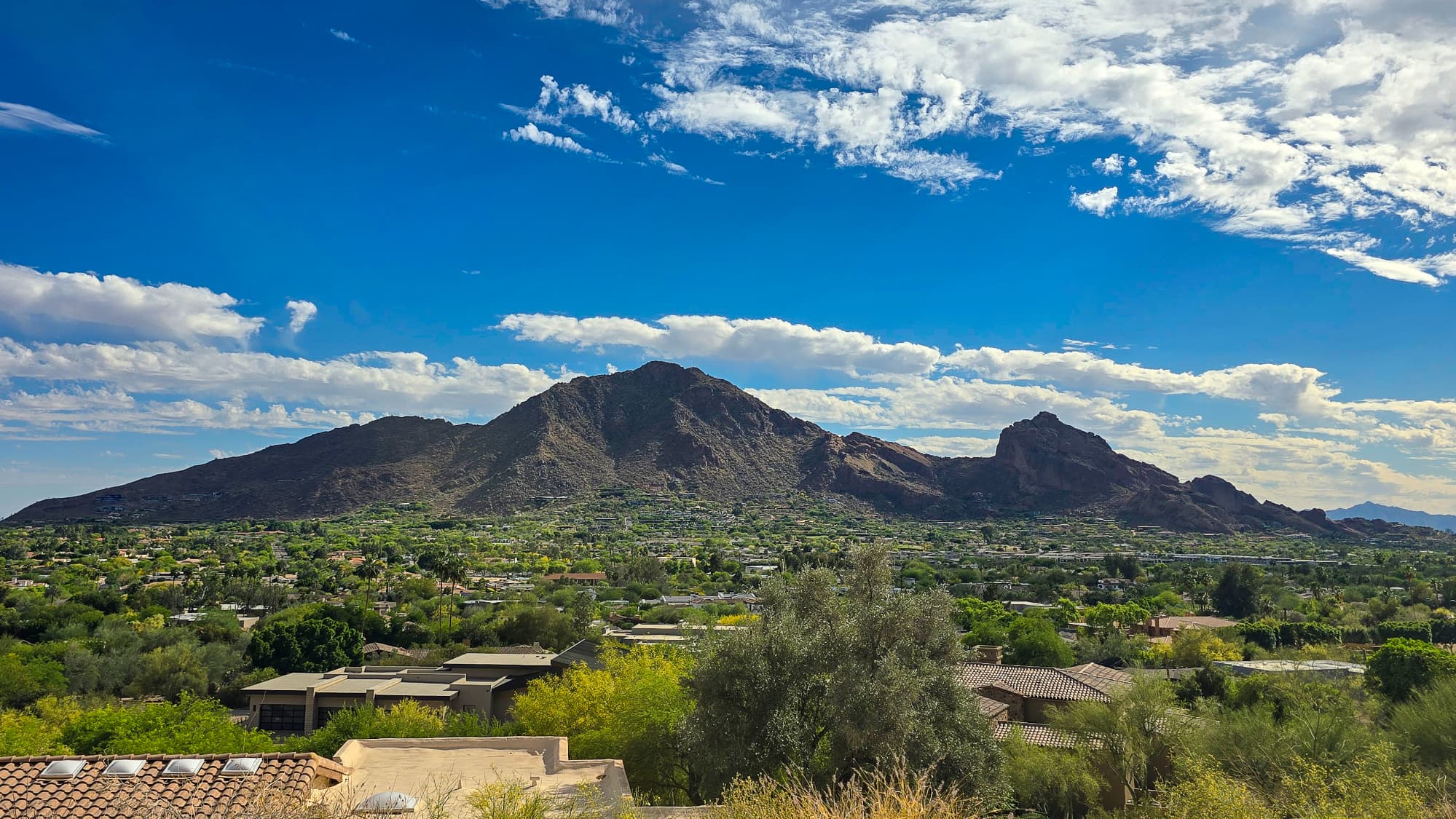 Camelback Mountain rises above residential estates in Paradise Valley, the Phoenix-area suburb named the richest small town in Arizona.