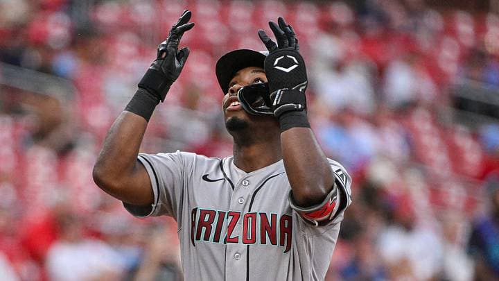 Arizona Diamondbacks batter looks upward during an at‑bat at Chase Field; the club made a surprise roster move this week, optioning a rookie infielder.