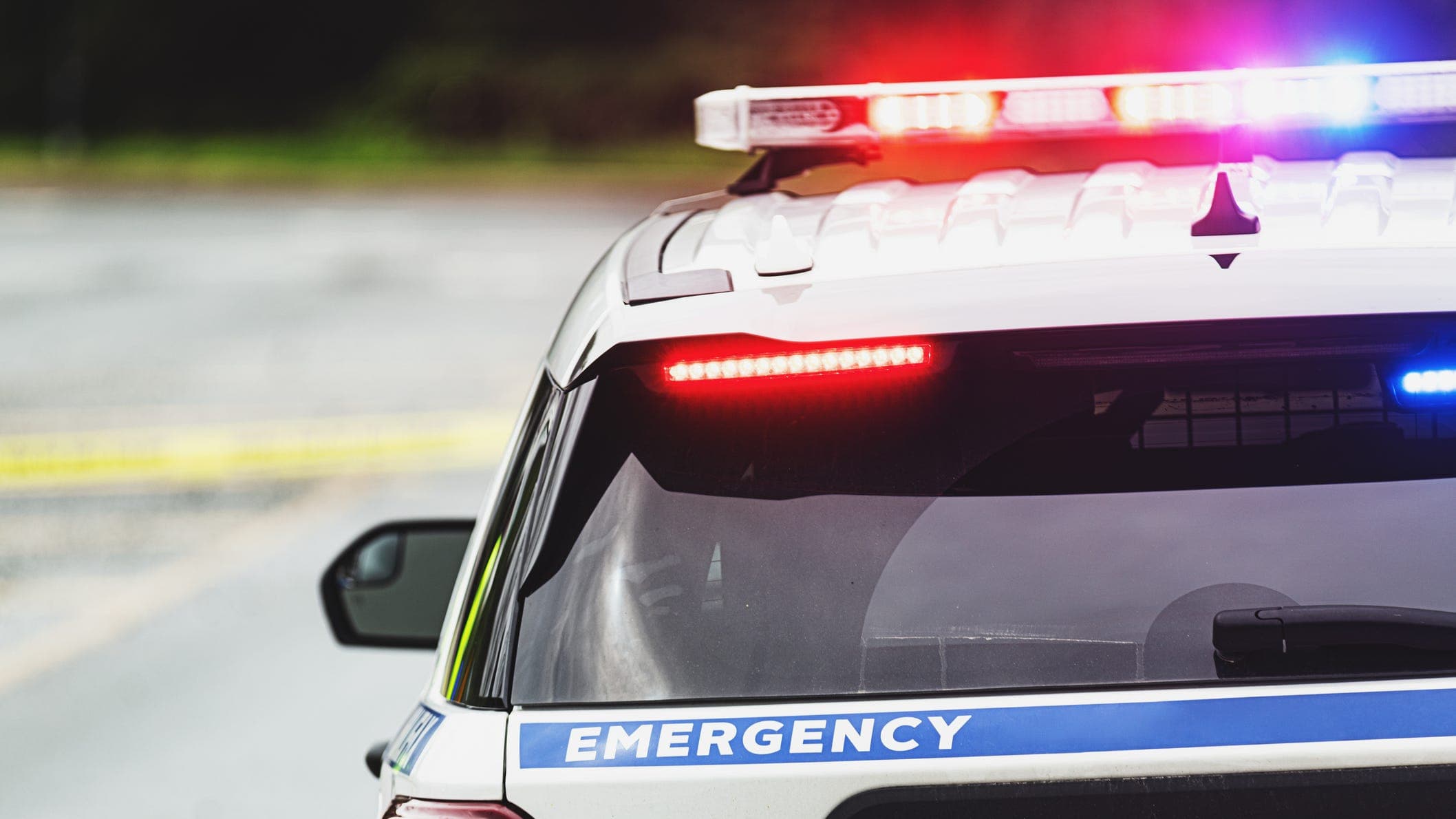 A Surprise police vehicle with emergency lights activated at a scene after officers discovered a man's body in a West Valley riverbed on July 3, 2026.