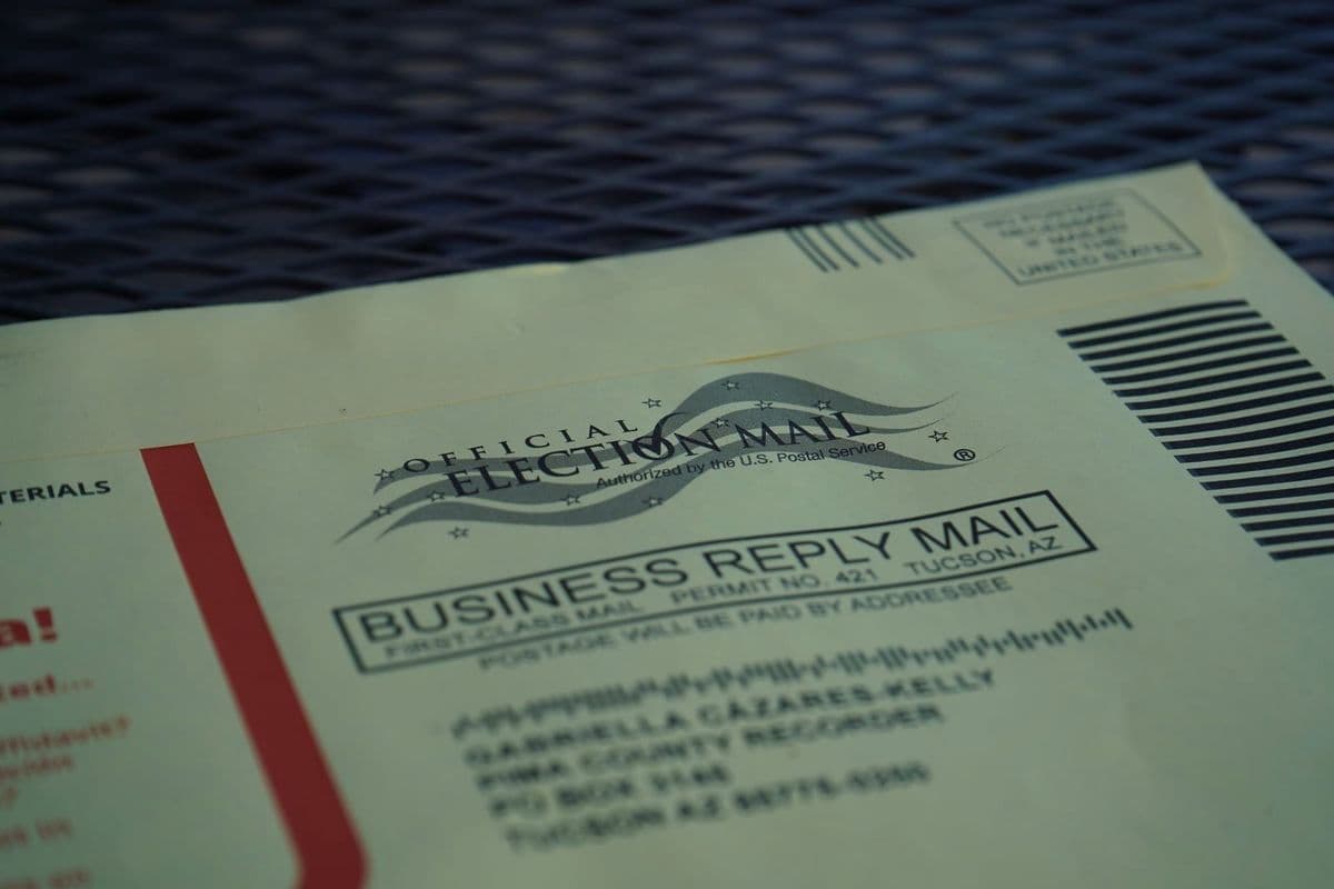A Pima County mail ballot envelope marked 'Official Election Mail' — voters can request mail ballots ahead of the July 14 mail deadline for the July 21 primary.