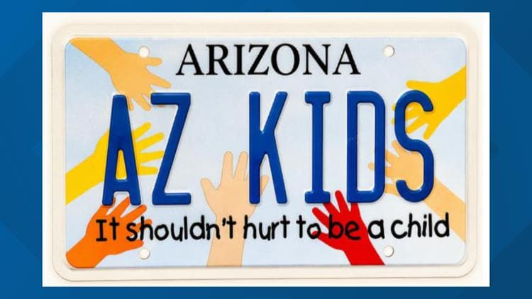The Arizona 'AZ KIDS' specialty license plate bearing the slogan 'It shouldn't hurt to be a child' — plate sales help fund child abuse prevention programs supported by the Governor’s $100,000 CAPA grants.