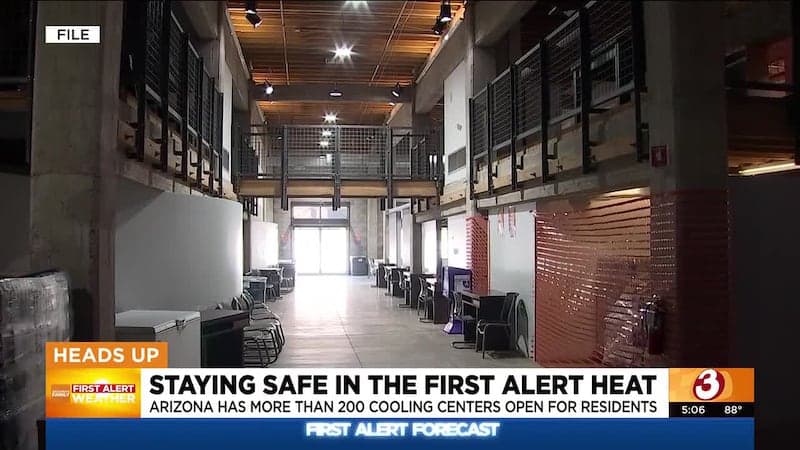 Interior of a designated cooling center with tables and seating — one of more than 200 sites Arizona has opened to help residents stay safe as the heat ramps up.