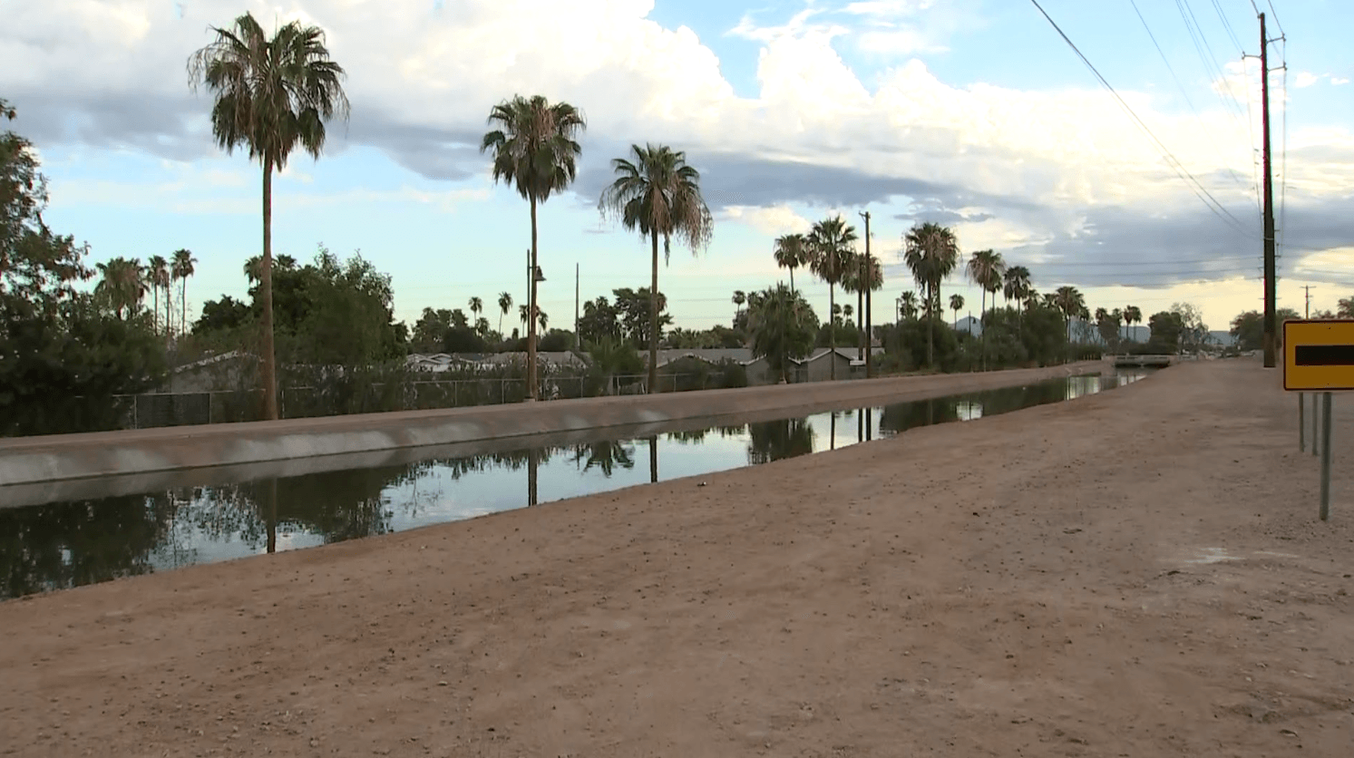 The canal near the Tempe–Mesa border where deputies say a body was recovered early Saturday; scene pictured just west of University and Dobson roads.