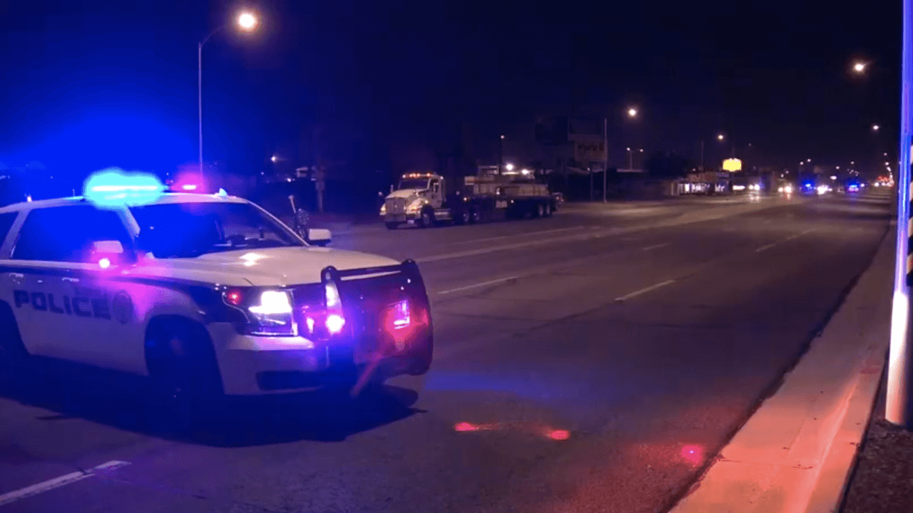A Glendale police SUV blocks Grand Avenue early Monday as officers respond to a crash that left a pedestrian seriously injured and prompted the road closure.