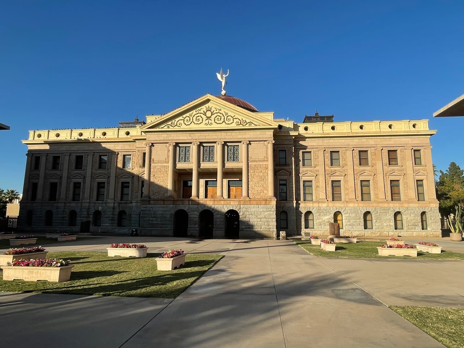 Arizona State Capitol in Phoenix on a clear morning — backdrop to the LD-10 House race as Olson holds an early lead in returns.
